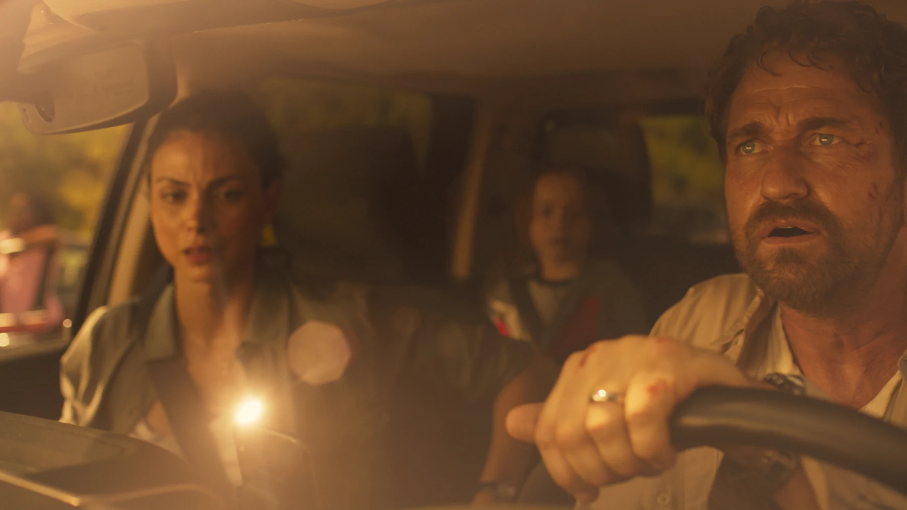 The Garrity family driving during the evacuation in Greenland (2020)